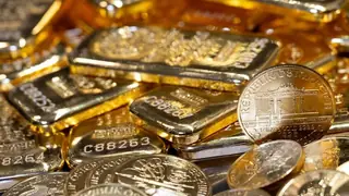 Altın, enflasyon baskısı ve doların yükselişiyle kayıplarının bir kısmını telafi etti